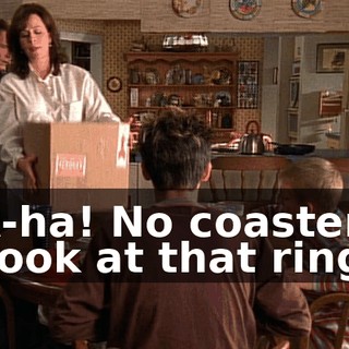 A-ha! No coaster. Look at that ring.