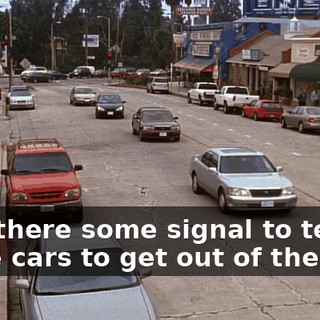 Isn't there some signal to tell these cars to get out of the way?