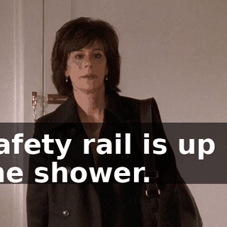 Safety rail is up in the shower.