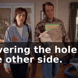 covering the hole on the other side.
