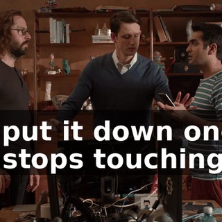 I'll put it down once he stops touching it.