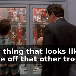 That thing that looks like it broke off that other trophy?