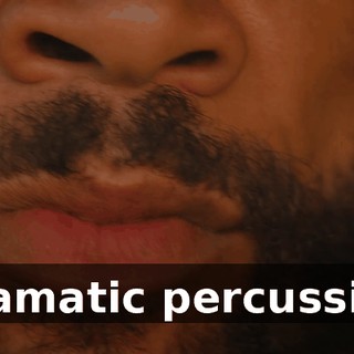 [dramatic percussion]