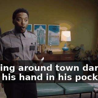 walking around town dancing with his hand in his pocket.