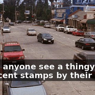 Does anyone see a thingy of one-cent stamps by their feet?