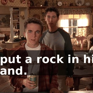 I put a rock in his hand.