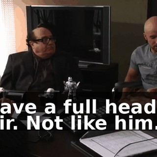 I have a full head of hair. Not like him.
