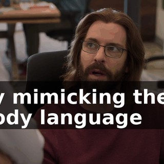 by mimicking their body language