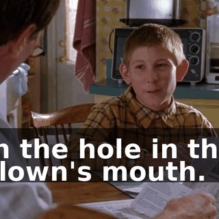 in the hole in the clown's mouth.