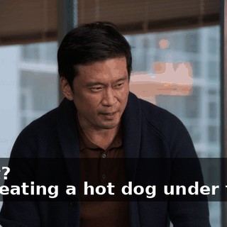 -What? -He's eating a hot dog under there.