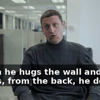 When he hugs the wall and crab walks, from the back, he does.