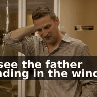 we see the father standing in the window.