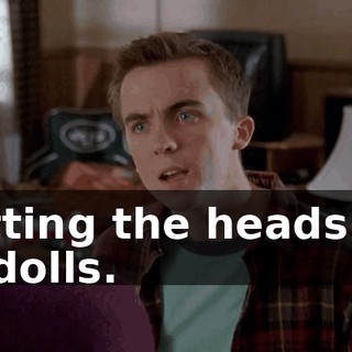 cutting the heads off of dolls.