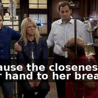 Because the closeness of your hand to her breast...