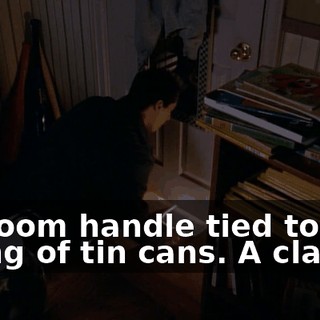 A broom handle tied to a string of tin cans. A classic.