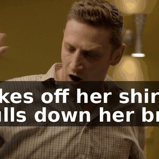 takes off her shirt, pulls down her bra.