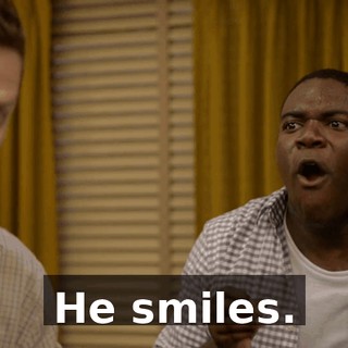 He smiles.