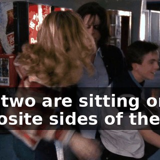 You two are sitting on opposite sides of the car.