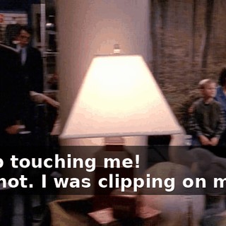 - Stop touching me! - I'm not. I was clipping on my tie.