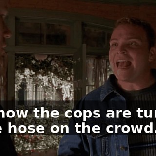 and now the cops are turning a fire hose on the crowd.