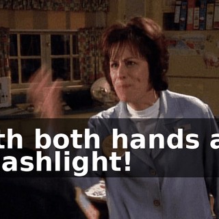 With both hands and a flashlight!