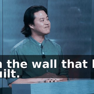 on the wall that he built.