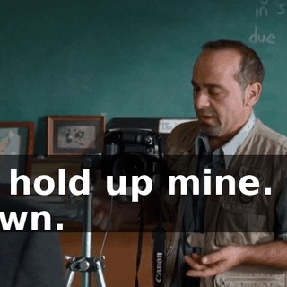 I'll hold up mine. Sit down.