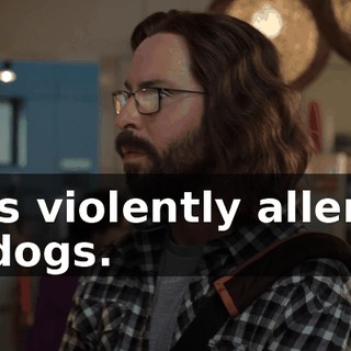 He's violently allergic to dogs.