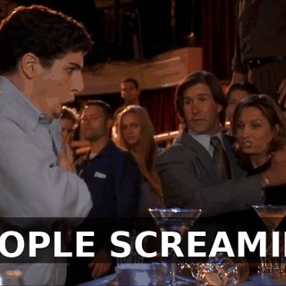(PEOPLE SCREAMING)