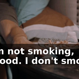 - I'm not smoking, Elwood. I don't smoke.