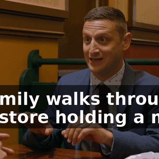 A family walks through the store holding a map.