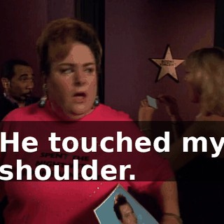 He touched my shoulder.