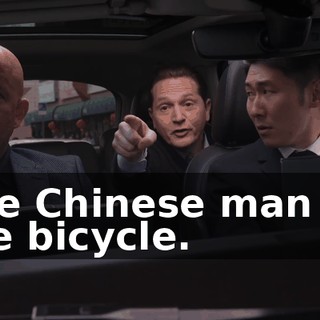 The Chinese man on the bicycle.