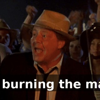 by burning the man.