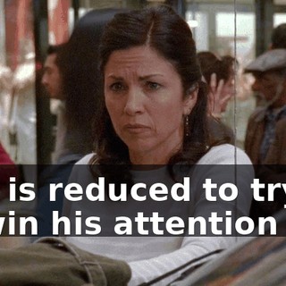 She is reduced to trying to win his attention