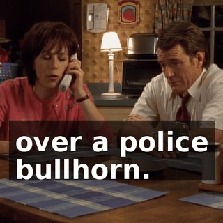 over a police bullhorn.
