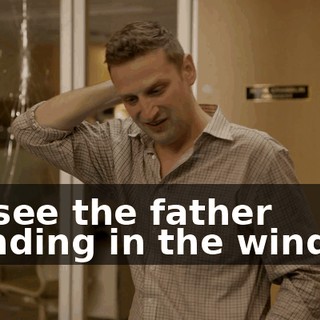 we see the father standing in the window.