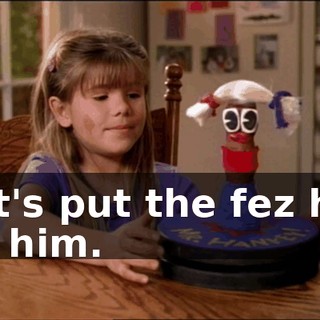 Let's put the fez hat on him.