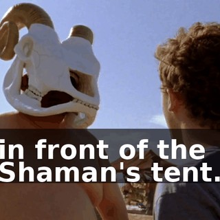 in front of the Shaman's tent.