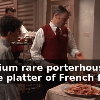 medium rare porterhouse, large platter of French fries,