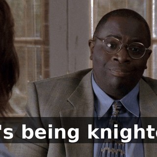He's being knighted.
