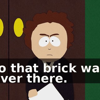 to that brick wall over there.