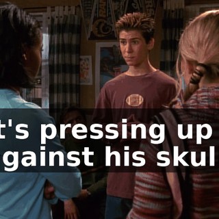 It's pressing up against his skull.