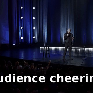[audience cheering]