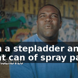 with a stepladder and a giant can of spray paint.