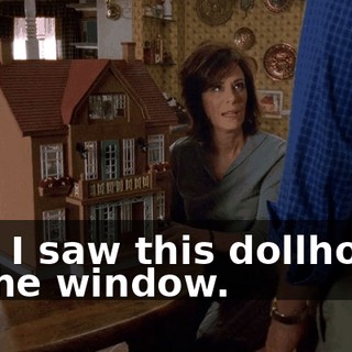 and I saw this dollhouse in the window.