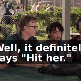 Well, it definitely says "Hit her."