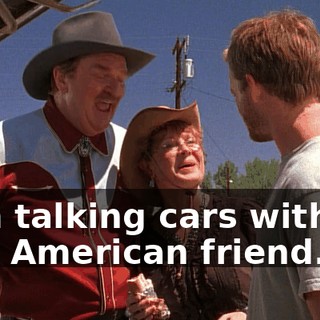 I am talking cars with my new American friend.