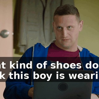 What kind of shoes do you think this boy is wearing?