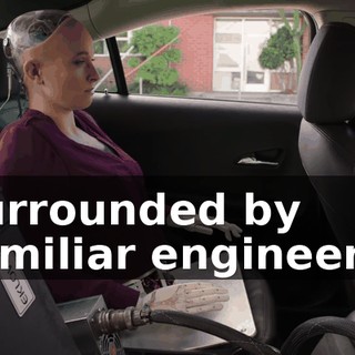 surrounded by familiar engineers,